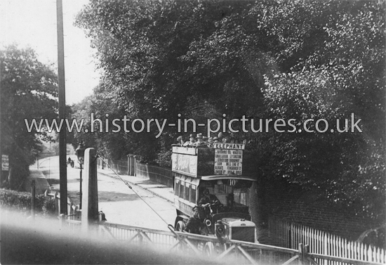 No.10 Motorbus Enroute to The Elephant at Snaresbrook Crossing, Eagle Lane, Snaresbrook, London. c.1904